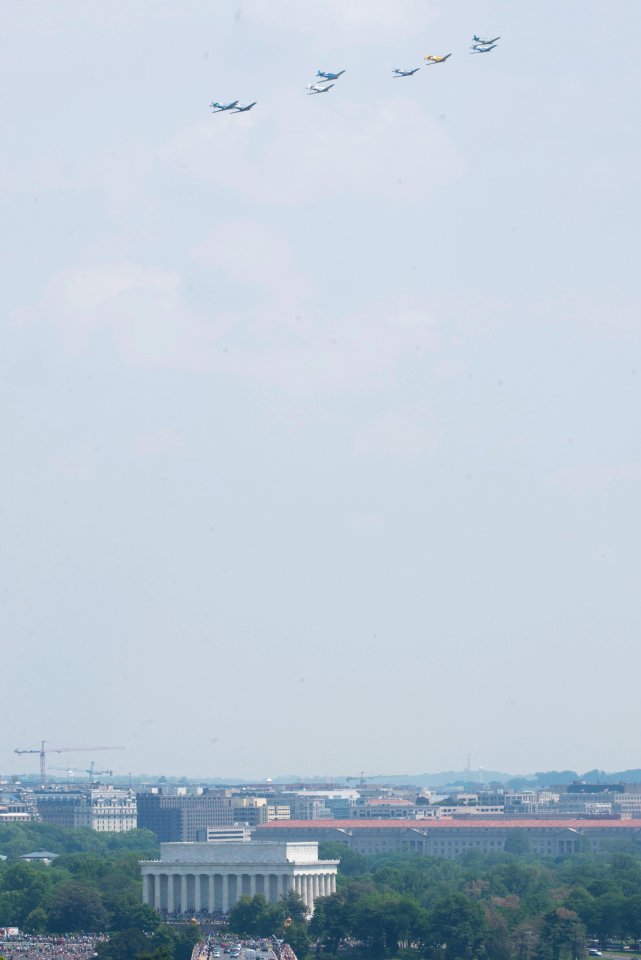 World War II era planes fly over Washington, D.C. seen from Arlington National Cemetery (16809203444)