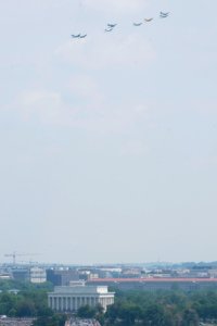 World War II era planes fly over Washington, D.C. seen from Arlington National Cemetery (16809203444)