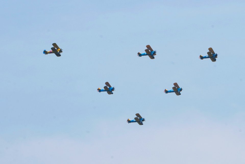 World War II era planes fly over Washington, D.C. seen from Arlington National Cemetery (17431714025)