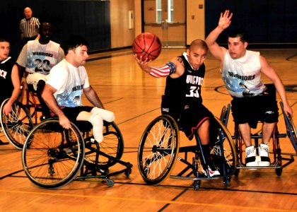 Wounded Warriors play wheelchair basketball. (8446975315)