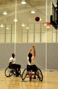 Wounded warriors practice wheelchair basketball. (8185202461)