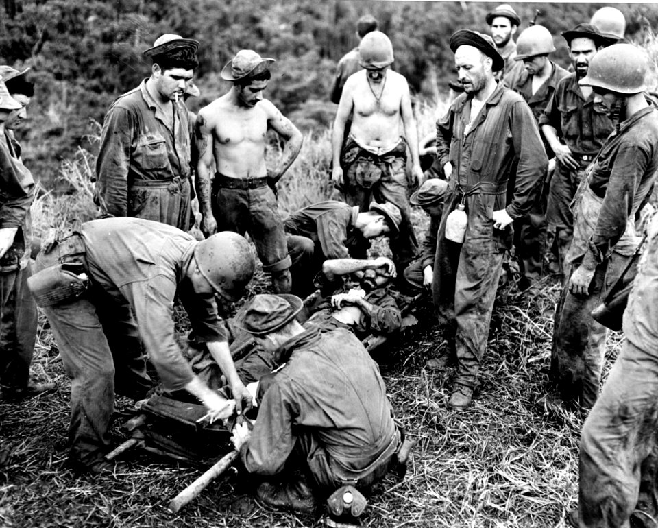 Wounded US soldier on stretcher on Guadalcanal c1942