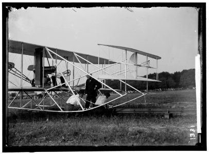 WRIGHT FLIGHTS, FORT MYER, VA, JULY 1909. FIRST ARMY FLIGHTS; WILBUR AND ORVILLE WRIGHT, CHARLIE TAYLOR; PUTTING PLANE ON LAUNCHING RAIL LCCN2016863807