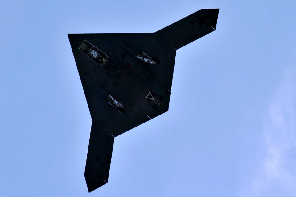 X-47B flies over USS George H.W. Bush (8738608943)