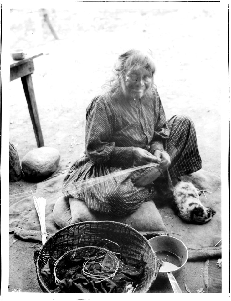 Yokut Indian woman basket maker, Tule River Reservation near Porterville, California, ca.1900 (CHS-3802)