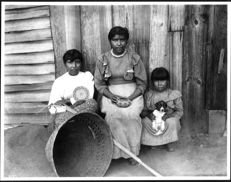 Yokut Indian women basket maker and two children, Tule River Reservation near Porterville, California, ca.1900 (CHS-3797)