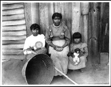 Yokut Indian women basket maker and two children, Tule River Reservation near Porterville, California, ca.1900 (CHS-3797)