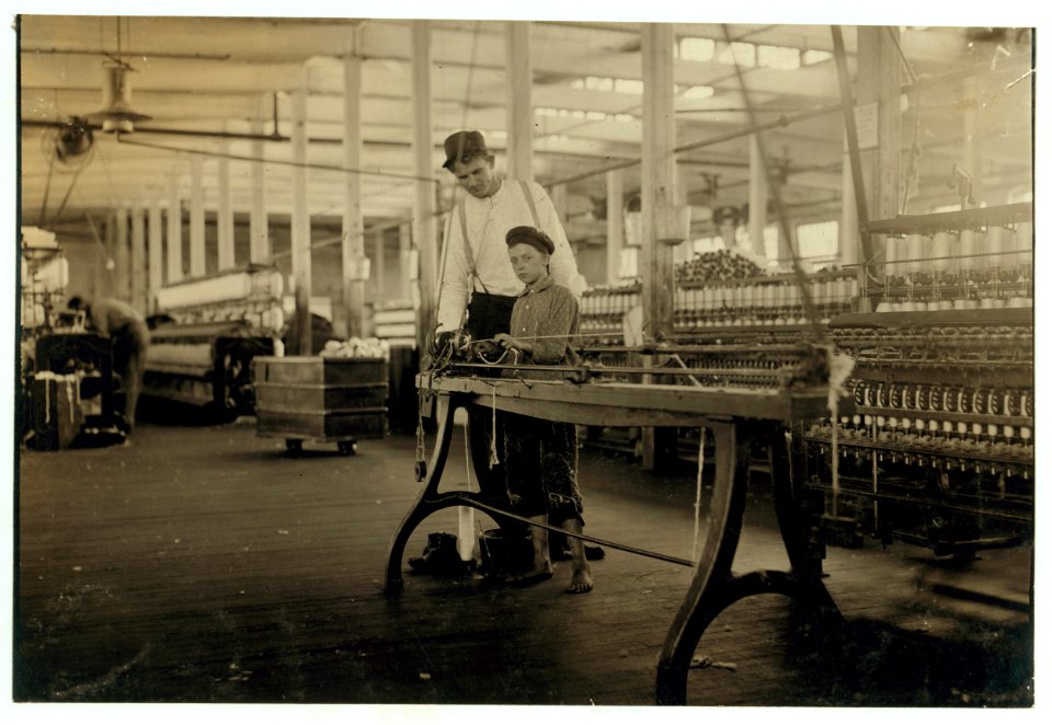 Young 'Band-boy' and overseer, Yazoo City Yarn Mills. LOC nclc.02097