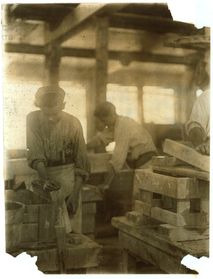 Young boy polishing marble in Vermont Marble Co., Centre Rutland, Vt. Most of these are illiterate. LOC nclc.04591