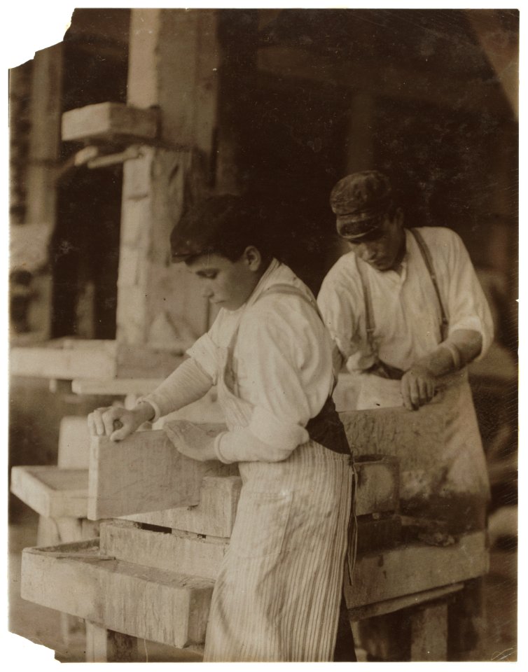 Young boy polishing marble in Vermont Marble Co., Centre Rutland, Vt. Most of these are illiterates. LOC nclc.04579