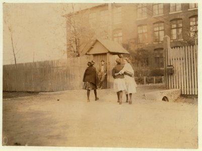 Young Girls going to work noon-hour Merrimac Mills. LOC nclc.01907