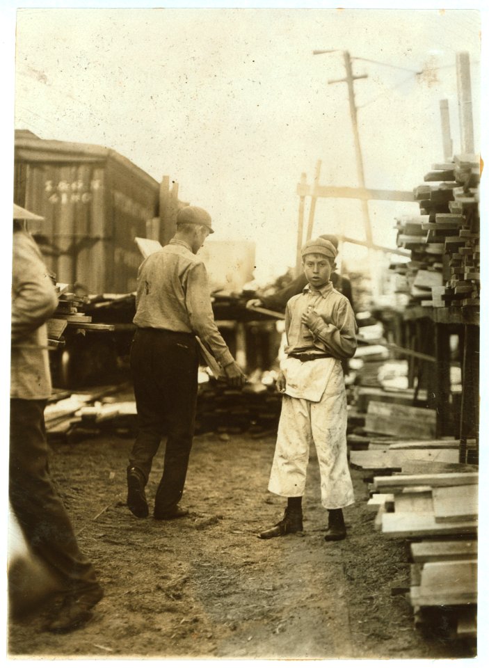 Young boy working for Hickok Lumber Co., Burlington, Vt. LOC nclc.04590