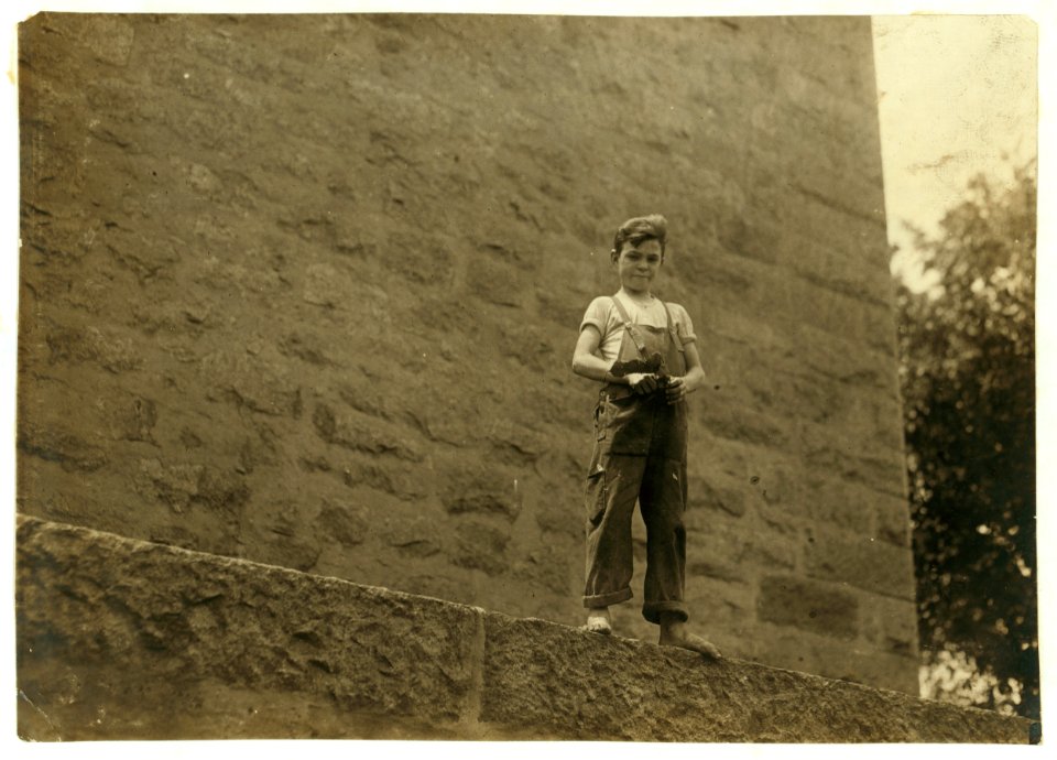 Young doffer in Durfee Mill. Said 17 years old. LOC cph.3a01143