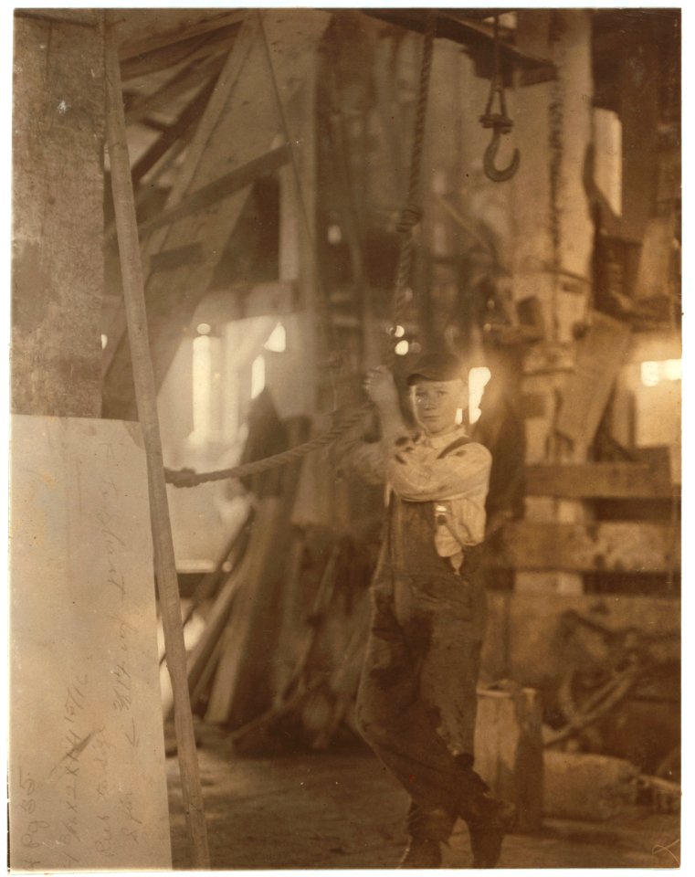 Young boy running machine in Vermont Marble Co., Centre Rutland, Vt. LOC nclc.05283
