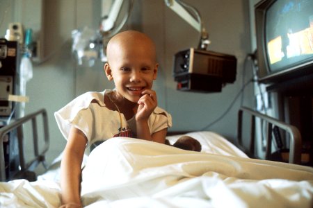 Young girl receiving chemotherapy photo