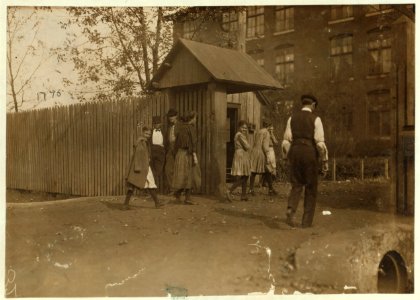 Young girls going to work noon-hour Merrimac Mills. LOC nclc.01909