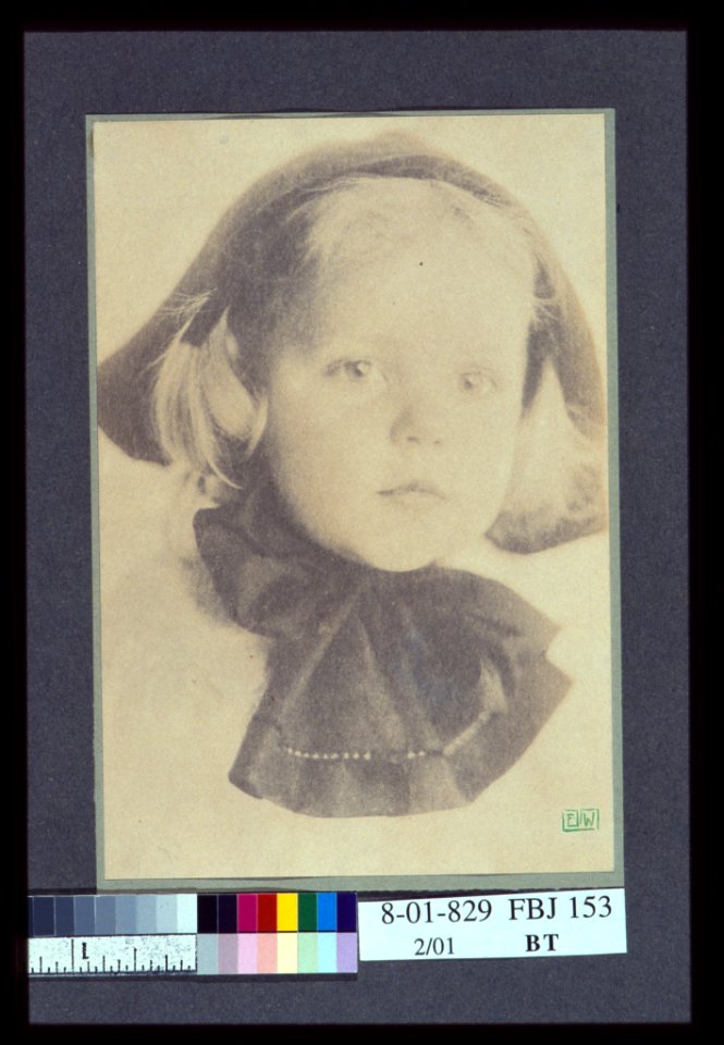 Young girl with a hat tied with a large bow, head-and-shoulders portrait, facing front) - EW LCCN2004676343