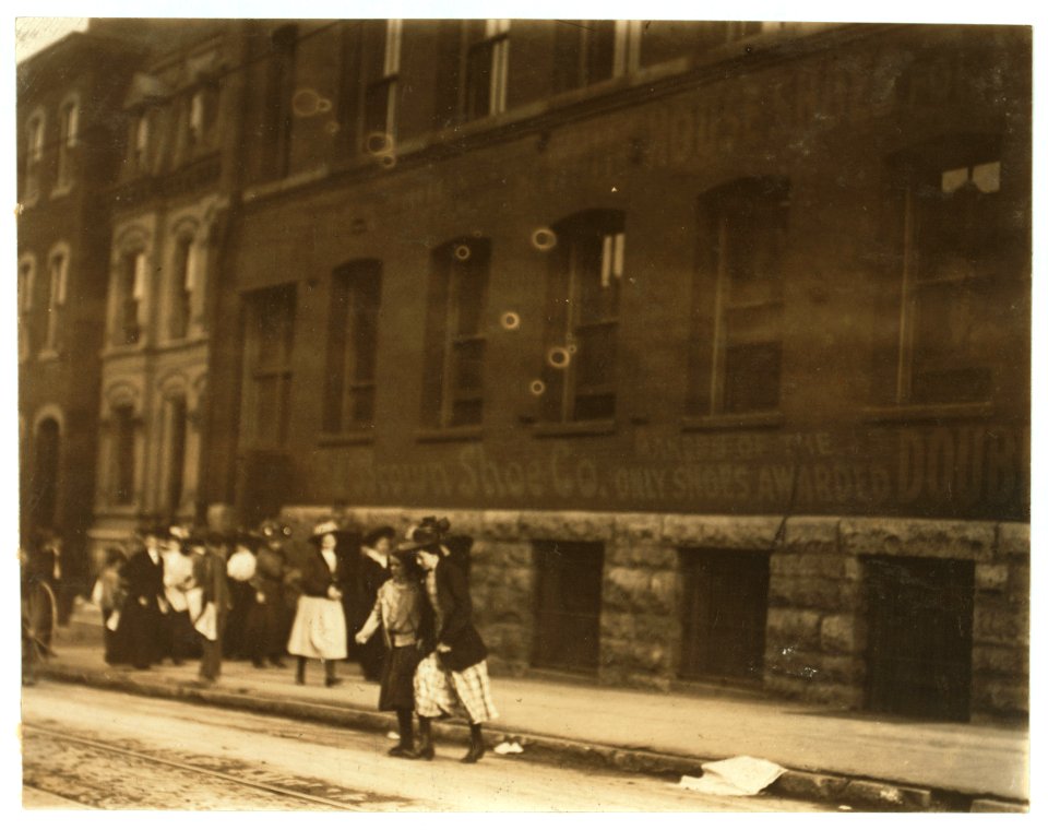 Young girls going home from Brown's shoe factory. (Washington & 18th Sts) at close of day. May 10 th, 1910. LOC nclc.04648