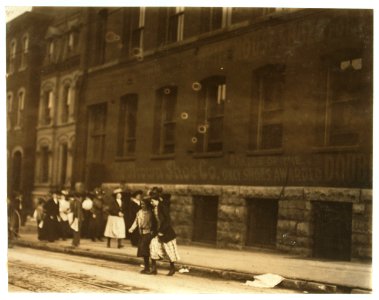 Young girls going home from Brown's shoe factory. (Washington & 18th Sts) at close of day. May 10 th, 1910. LOC nclc.04648