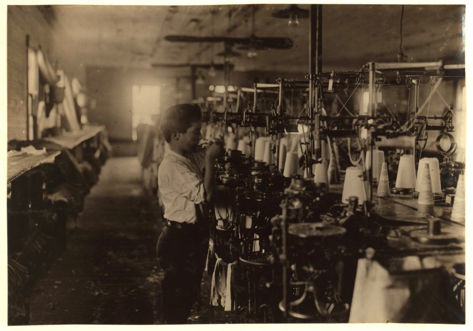 Young knitter in the Crescent Hosiery Mill. LOC nclc.05567