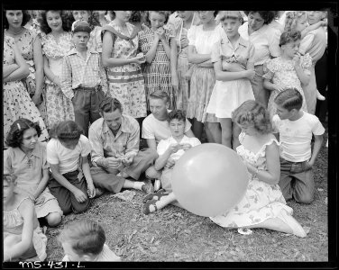 Young people of community at 4th of July celebration in city park. Price is essentially a city whose economy is based... - NARA - 540411