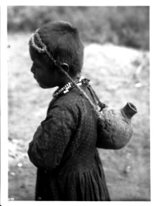 Young Havasupai Indian girl, Waluthama's daughter, carrying an Olla or water jug, ca.1899 (CHS-3788)