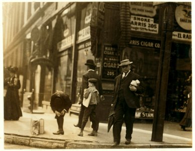 Young newsboy 6th and Pine Sts. May 10th, 1910. LOC nclc.03509