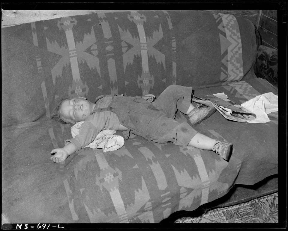 Young son of Ben Baker, miner, living in company housing project. Union Pacific Coal Company, Reliance Mine... - NARA - 540556