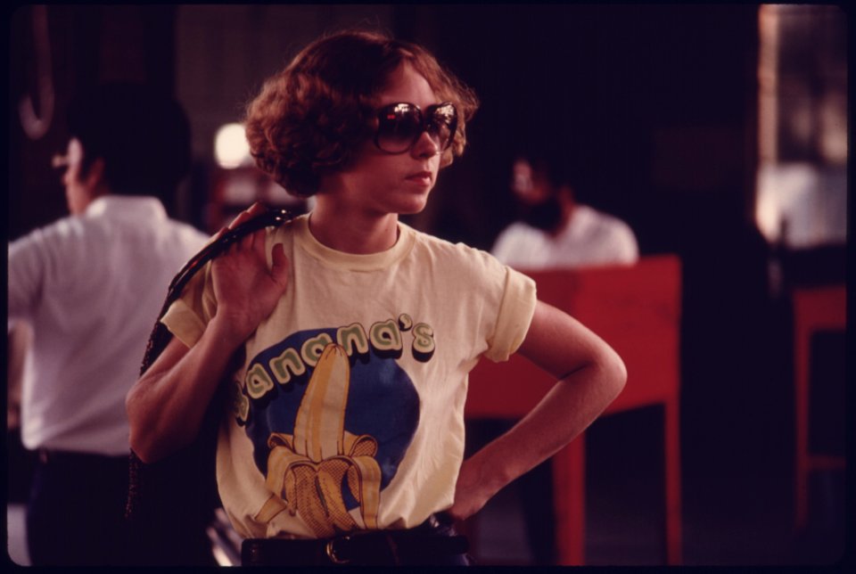 Young Woman Watches as Her Car Goes through Testing at an Auto Emission Inspection Station in Downtown Cincinnati, Ohio...09-1975 (4266538236)