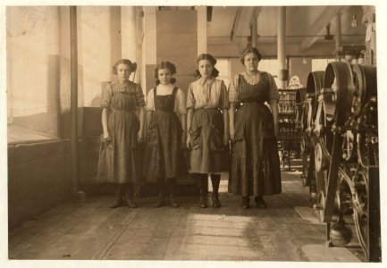 Young spinners in Cornell Mill. Posed by boss. LOC cph.3a18642