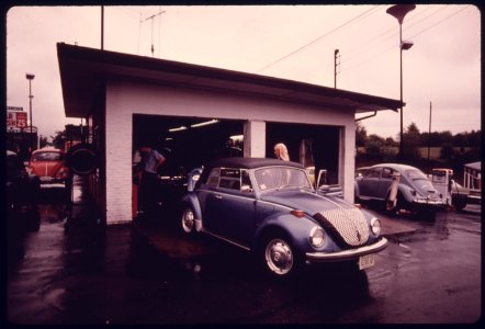 Young Woman Has Stopped at a Service Station for Engine Adjustment after Her Car Had Failed the Emissions Test at an Auto Emission Inspection Station in Downtown Cincinnati, Ohio...09-1975 (4266544574)