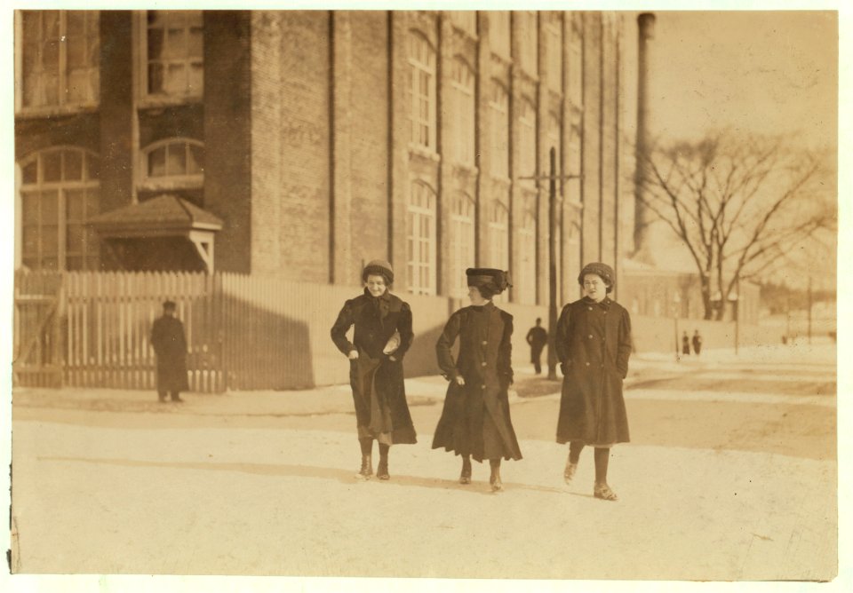 Young workers adolescence and younger in Manomet, Nonquitt and Nashawena Mills. Going to dinner and back to wrk. Noon. January 9, 1912. Richard K. Conant, witness. LOC nclc.02511