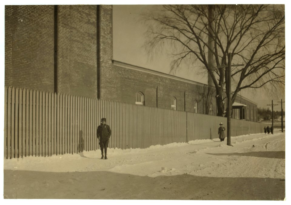 Young workers adolescence and younger in Manomet, Nonquitt and Nashawena Mills. Going to dinner and back to wrk. Noon. January 9, 1912. Richard K. Conant, witness. LOC nclc.02515