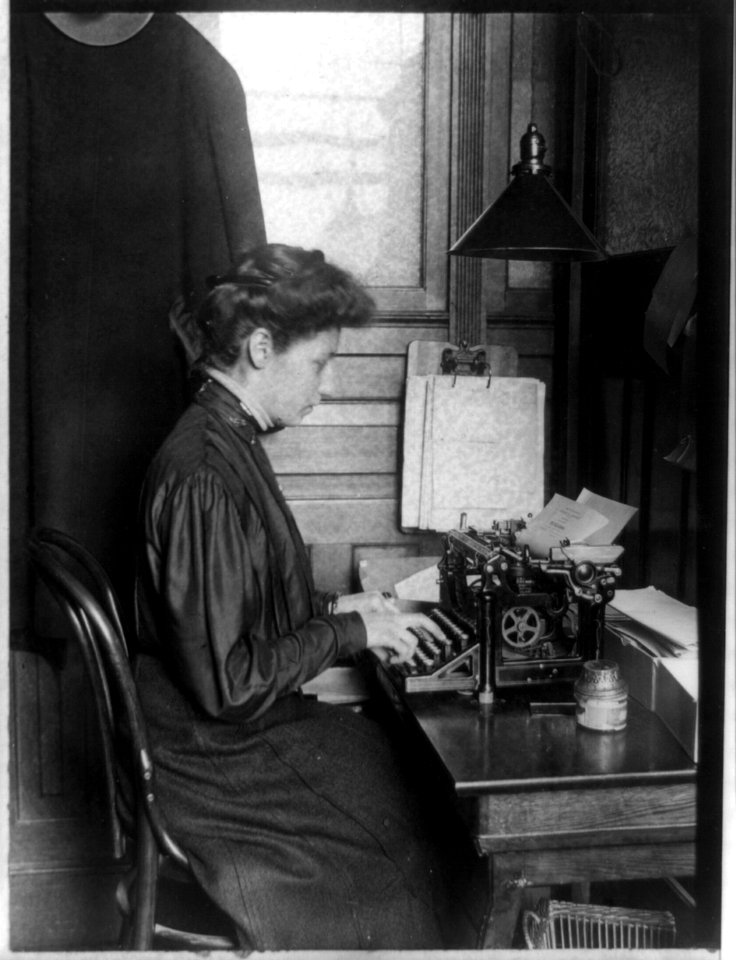Young woman typing LCCN2013647255