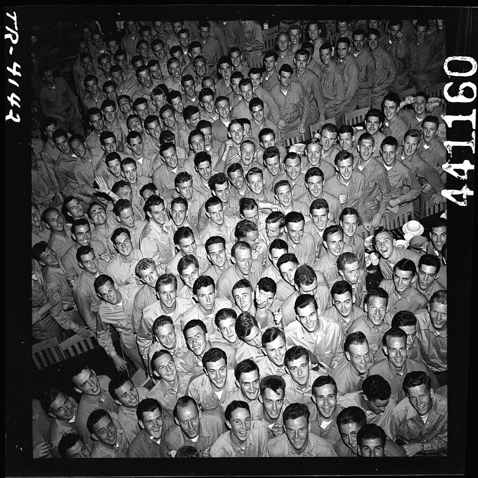 Young men training at pre-flight school at Del Monte Hotel, Del Monte, Calif., grin as they file out of the mess hall. - NARA - 520807