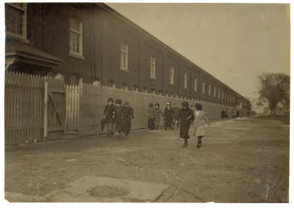 Young workers adolescence and younger in Manomet, Nonquitt and Nashawena Mills. Going to dinner and back to wrk. Noon. January 9, 1912. Richard K. Conant, witness. LOC nclc.02513