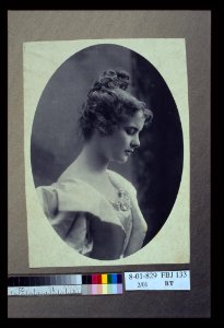 Young woman, facing right, head-and-shoulders profile portrait LCCN2004676295 photo