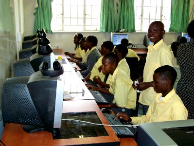Zambian kids learning how to use computers