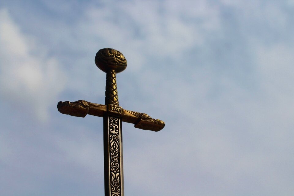 Celtic sword against the sky against
