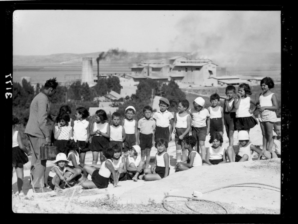 Zionist activities around Haifa. Haifa, school children on Carmel slope in background the Nesher (Cement Works) LOC matpc.15208