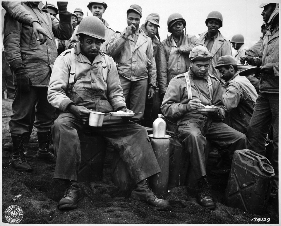 A kitchen was set up along the beach for the...labor battalion unloading the boats. This picture shows a couple of the - NARA - 531159
