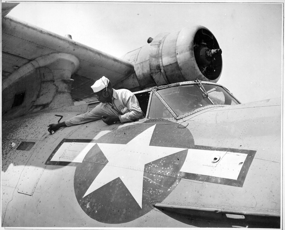 African-American mechanics work on PBY at NAS Seattle, WA, Alvin V. Morrison, AMM 3-c, doing overhaul., 04-27-1944 - NARA - 520648