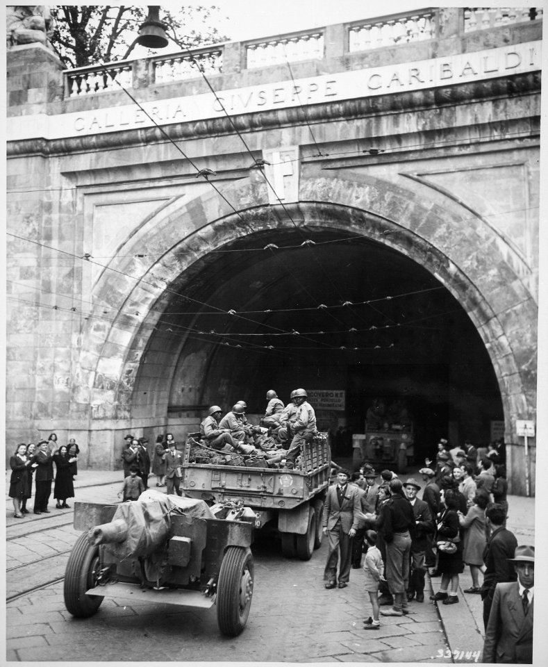 Genoa, Italy. In this newly liberated city the 92nd Division troops enter the Galleria Guiseppe (sic) Garibaldi., 04-2 - NARA - 531355