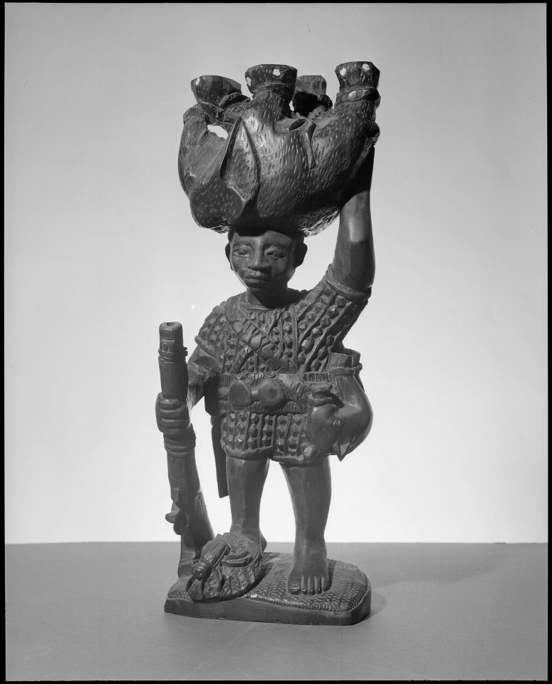 Hunter with Animal on His Head - NARA - 558888