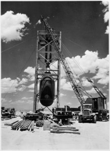 Jumbo atomic device being positioned for Trinity test at Alamogordo, New Mexico. - NARA - 558570