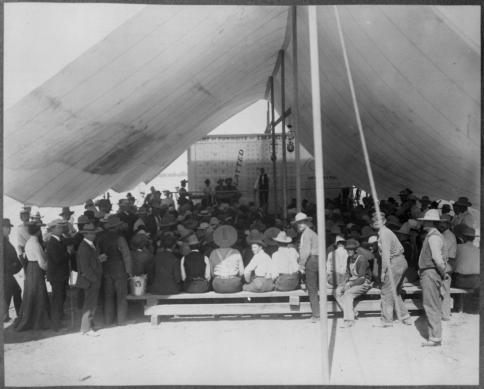 First Auction Sale of Lots at Imperial April 12, 1904. Inside the tent with the California Development Co. and hopeful - NARA - 516432