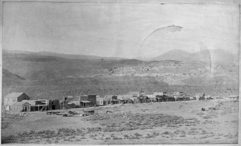 Gardiner Park Co., Montana, Looking North East, 1887. A one-sided street backed up to rocky foothills, 1887 - NARA - 516449