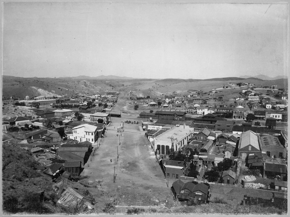 Nogales, Santa Cruz Co. Showing boundary line between Arizona and Mexico. General view of center of town from hillside - NARA - 516375