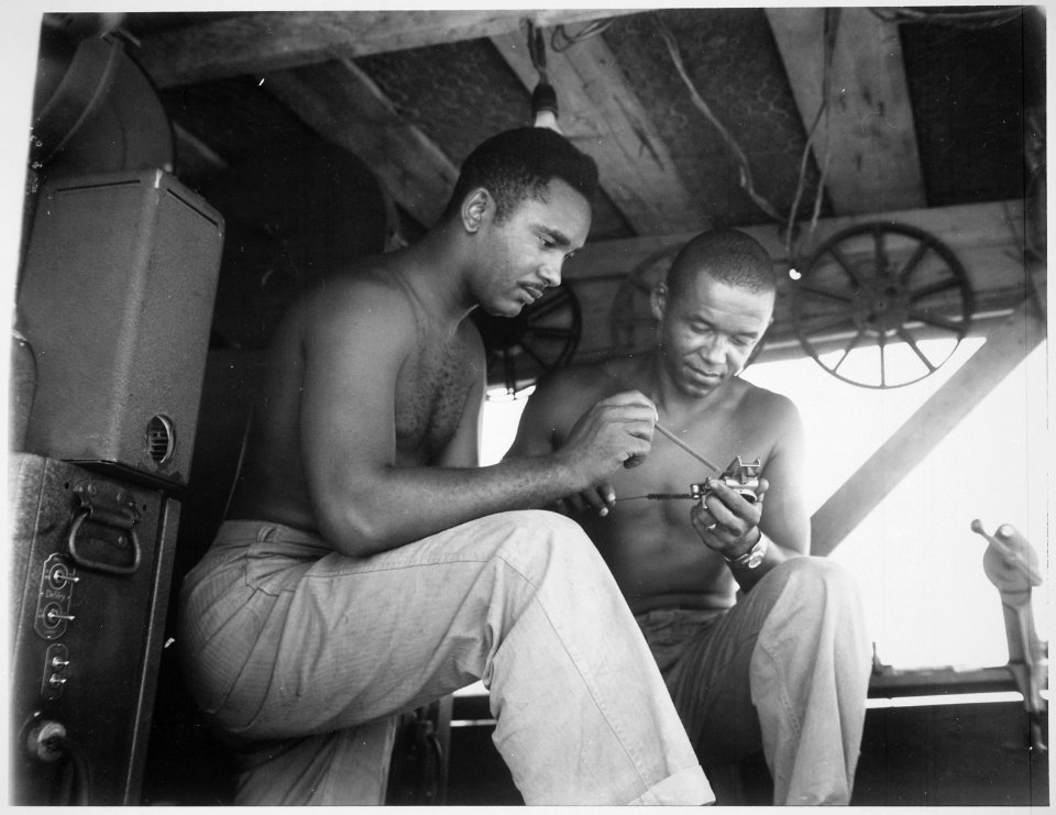 Two Negro Marine movie operators., 01-1945 - NARA - 532539
