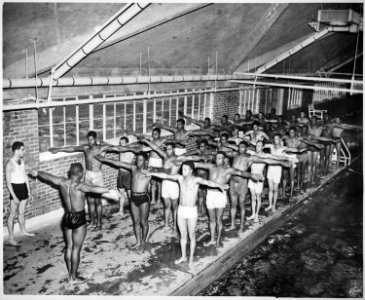 Under the direction of Swimming Instructor, Marine Pfc. Paul Tolliver..., Leathernecks in training at Montford Point Ca - NARA - 532367 photo